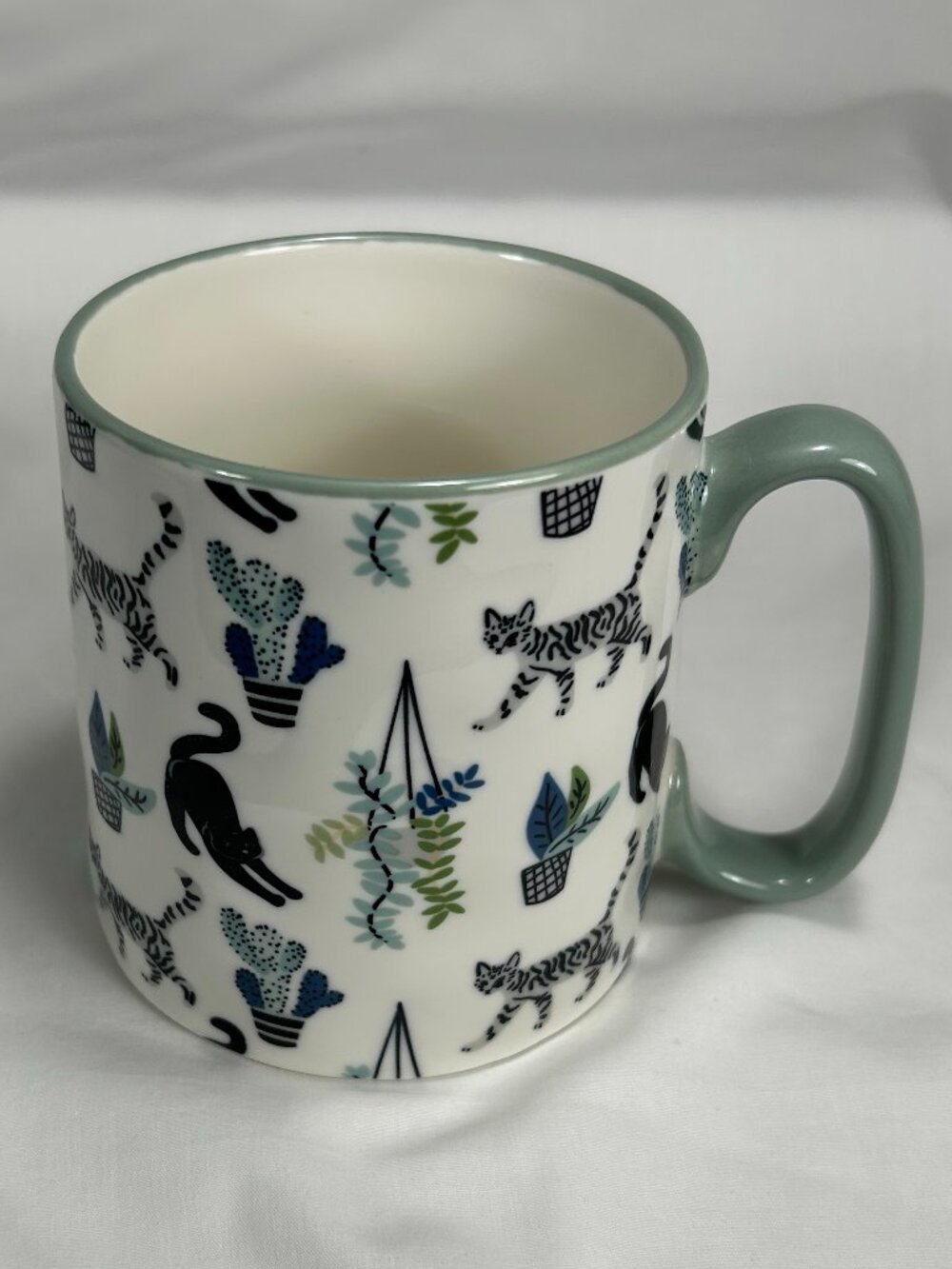 10 Strawberry St. animal arts coffee mug